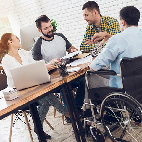 A group of people sitting at a table